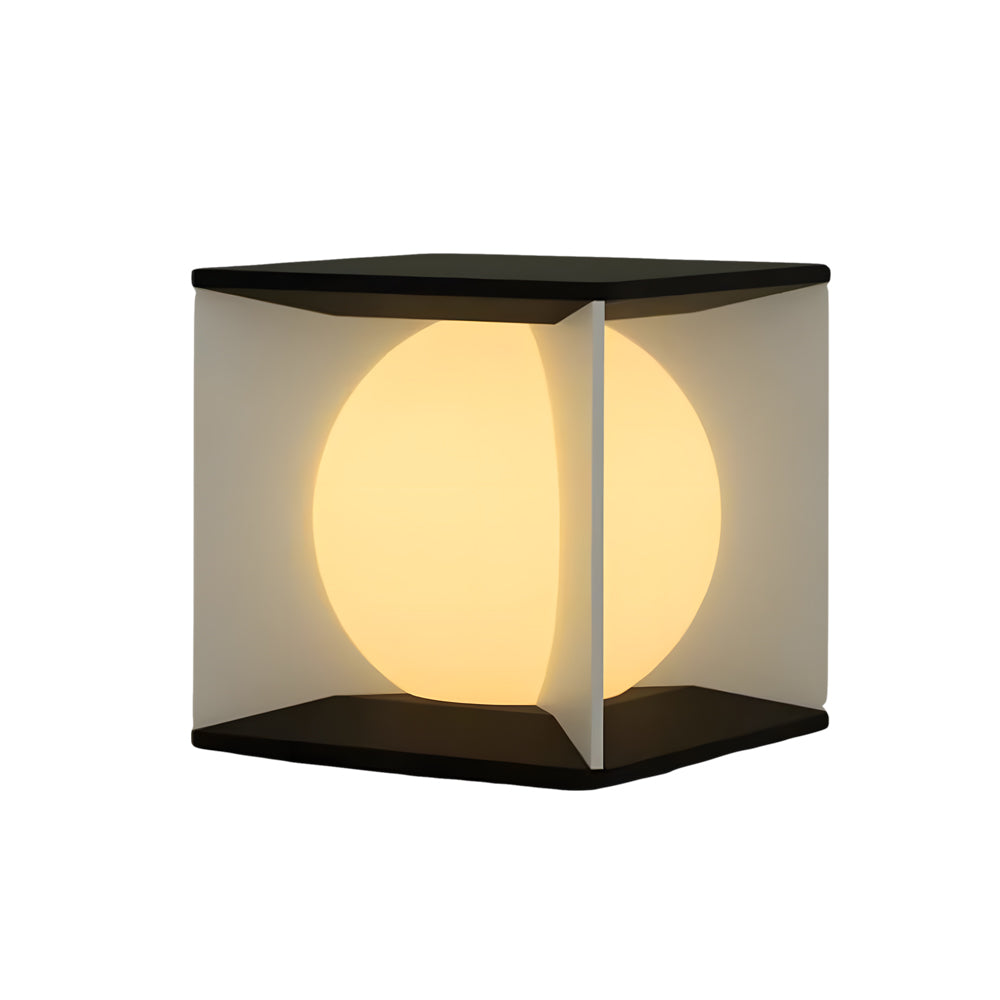 Square solar lantern with clean geometric design and golden interior lighting