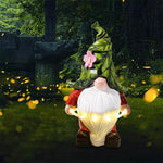 Gnome garden light with glowing belly illumination during daytime and nighttime comparison