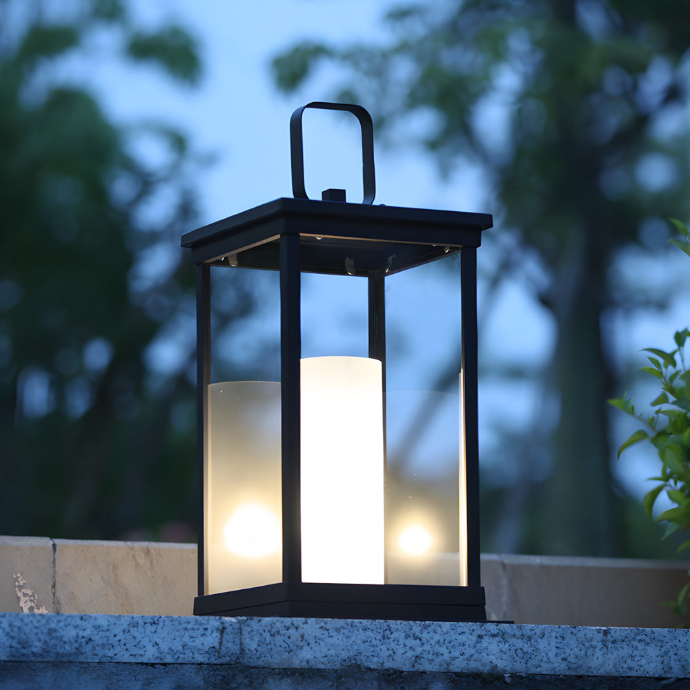 Modern LED lantern creating warm ambient lighting on outdoor stone surface at dusk