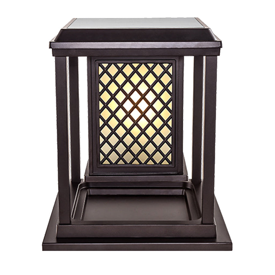 Angled view of contemporary outdoor light showing geometric panel construction and warm glow