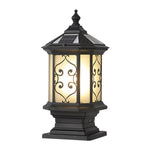 Traditional Asian-inspired post lantern with decorative scrollwork and warm amber glass panels