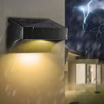 Contemporary wall-mounted LED fixture creating dramatic downward lighting effect during stormy evening atmosphere