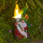 Gnome garden light with flame-shaped illumination creating atmospheric outdoor lighting