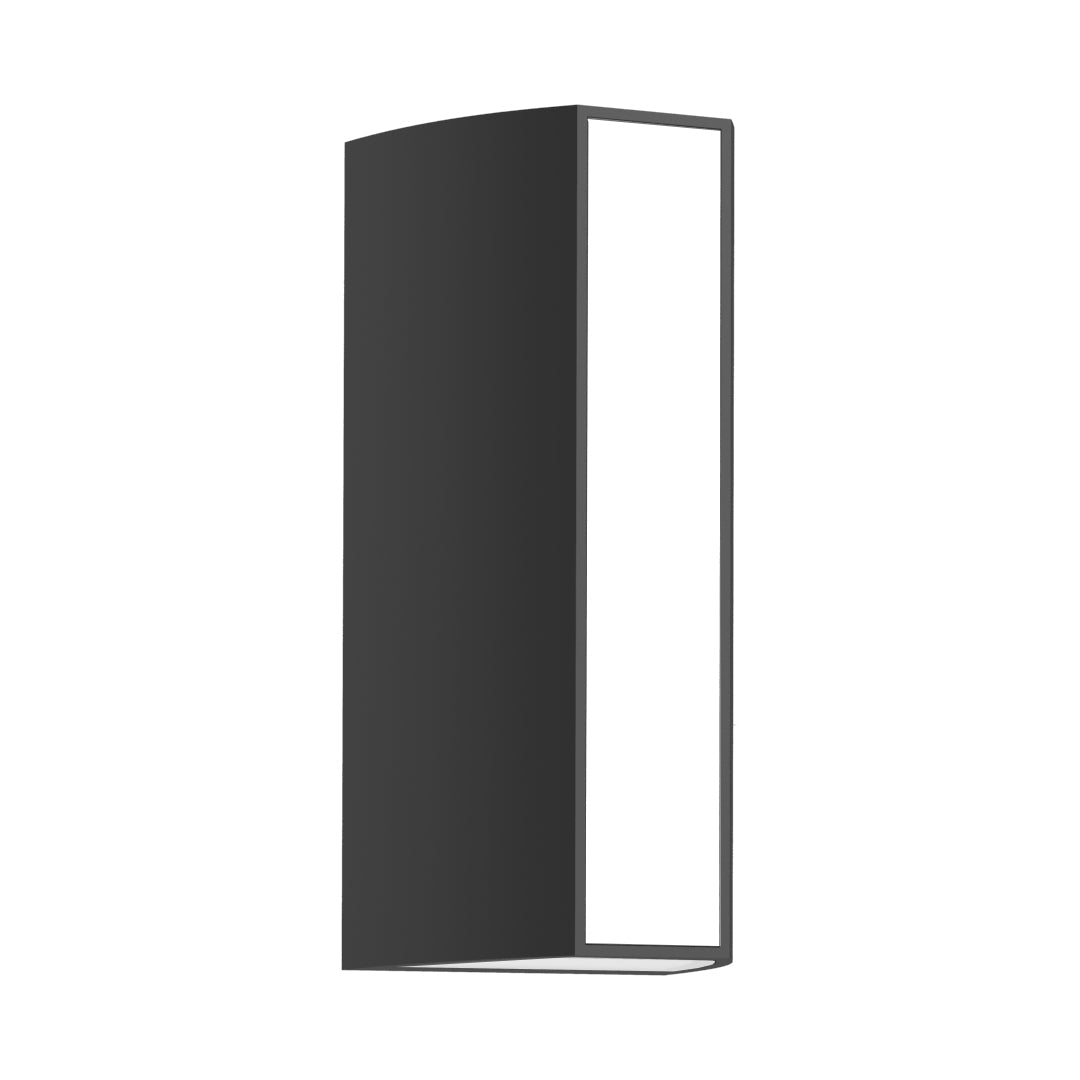 Outdoor wall light casting warm golden glow on brick surface with dramatic shadow effects