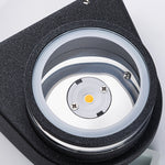 Modern black curved outdoor wall light with integrated LED and sleek geometric design