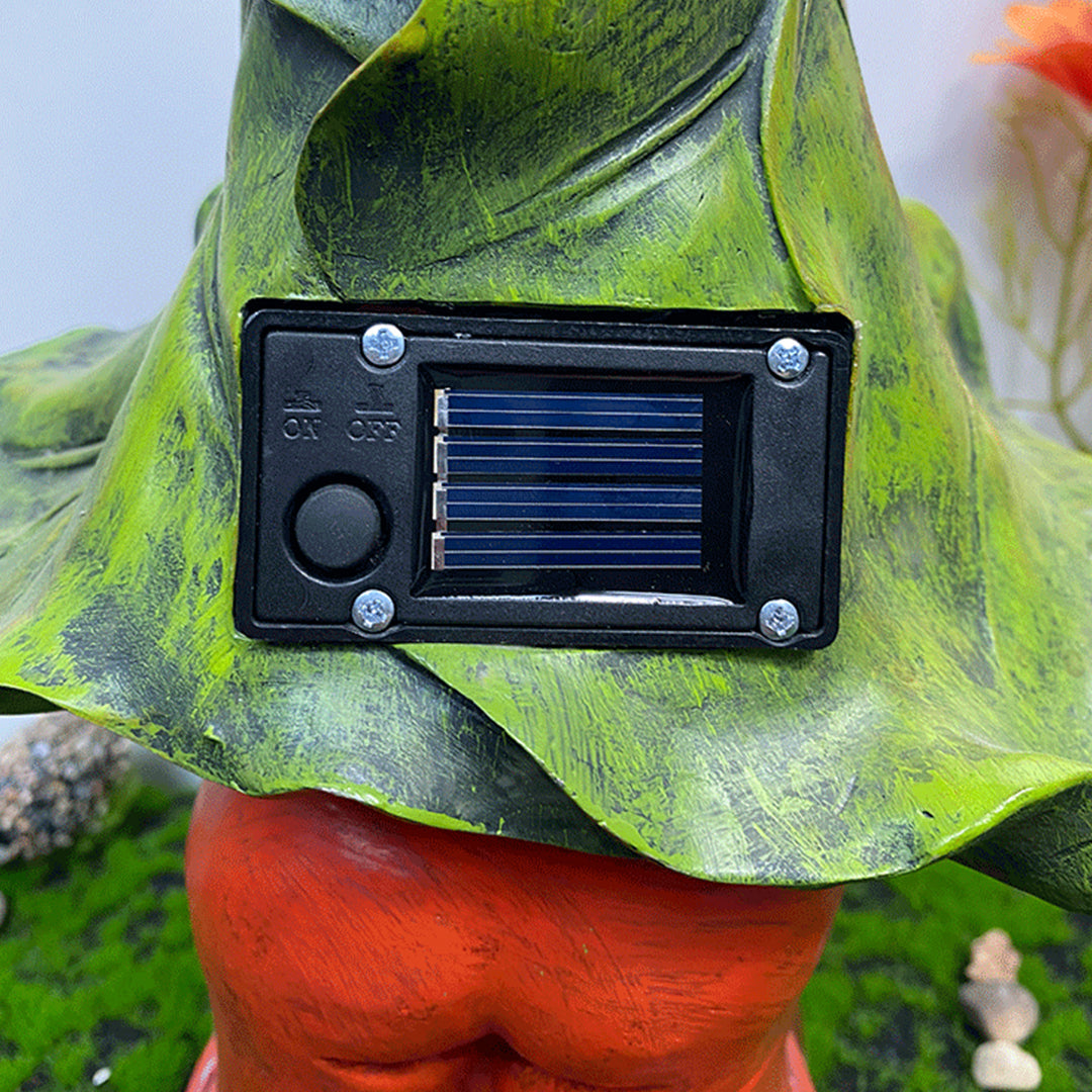 Solar panel integrated into gnome's hat showing eco-friendly LED garden lighting technology