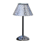 Decorative solar table lamp with intricate perforated metal shade and ornate base design