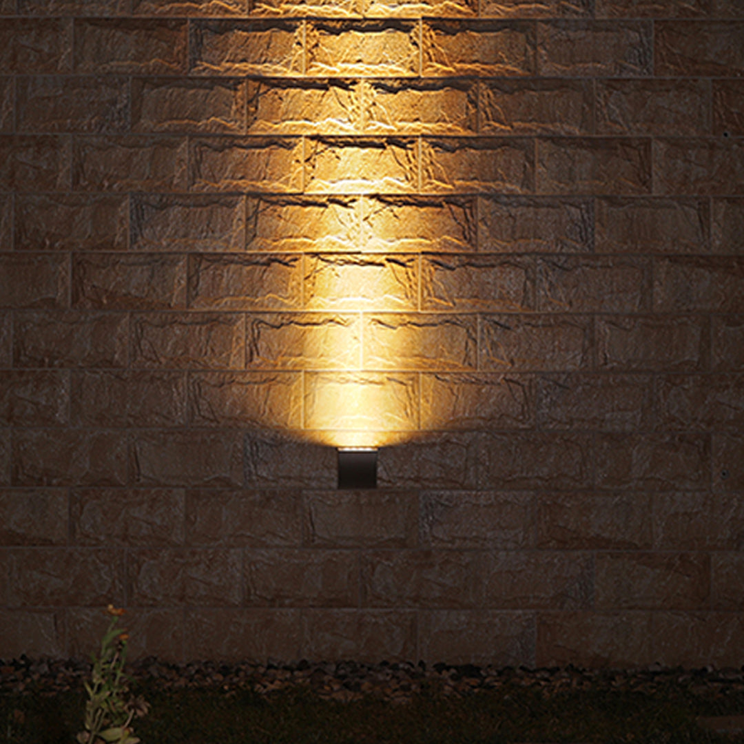 Classic bronze wall light with frosted glass shade in traditional lantern design