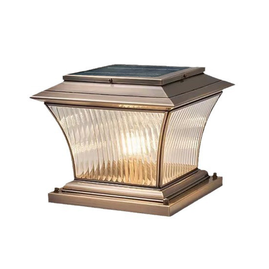 Classic pillar lantern with ribbed glass panels and antique bronze finish on white background