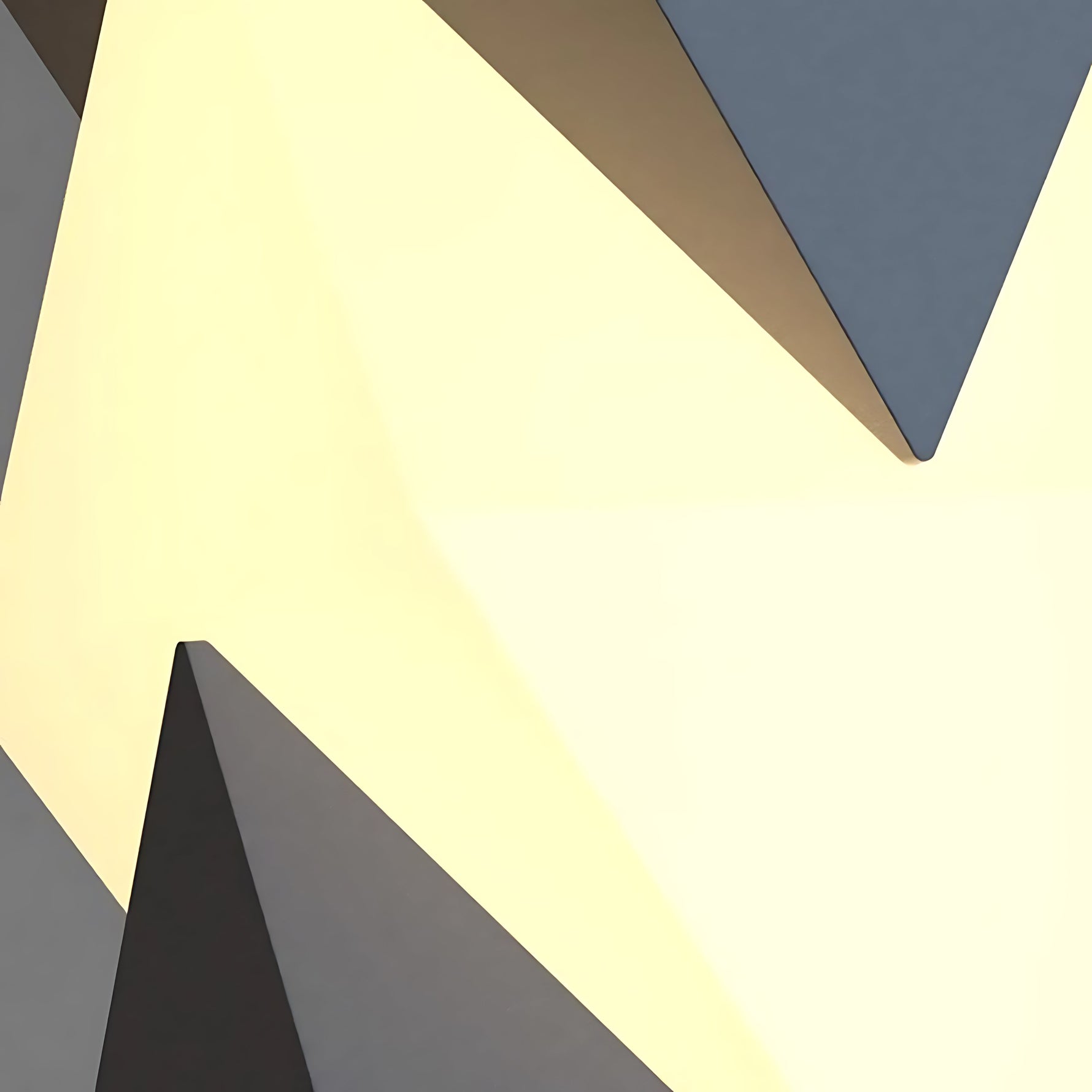 Modern angular post light with geometric V-shaped design creating dramatic upward and downward illumination
