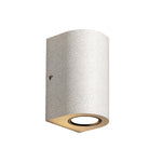 Cylindrical concrete outdoor light fixture with downward LED illumination and minimalist styling