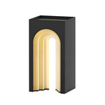 Black rectangular lamp with glowing arch cutout