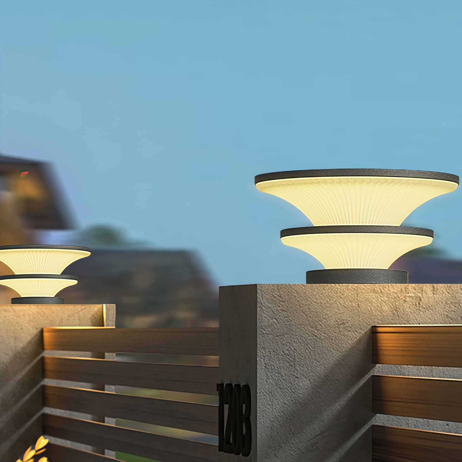 Architectural post lighting installation featuring geometric stacked elements in residential garden setting at twilight