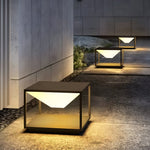 Architectural cubic fixtures stacked against concrete wall surface
