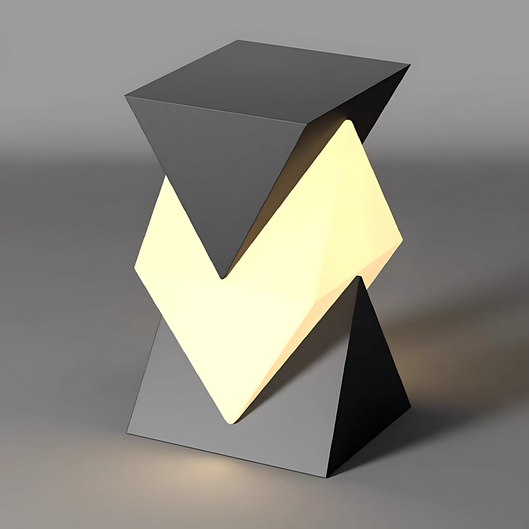 Modern angular post light with geometric V-shaped design creating dramatic upward and downward illumination