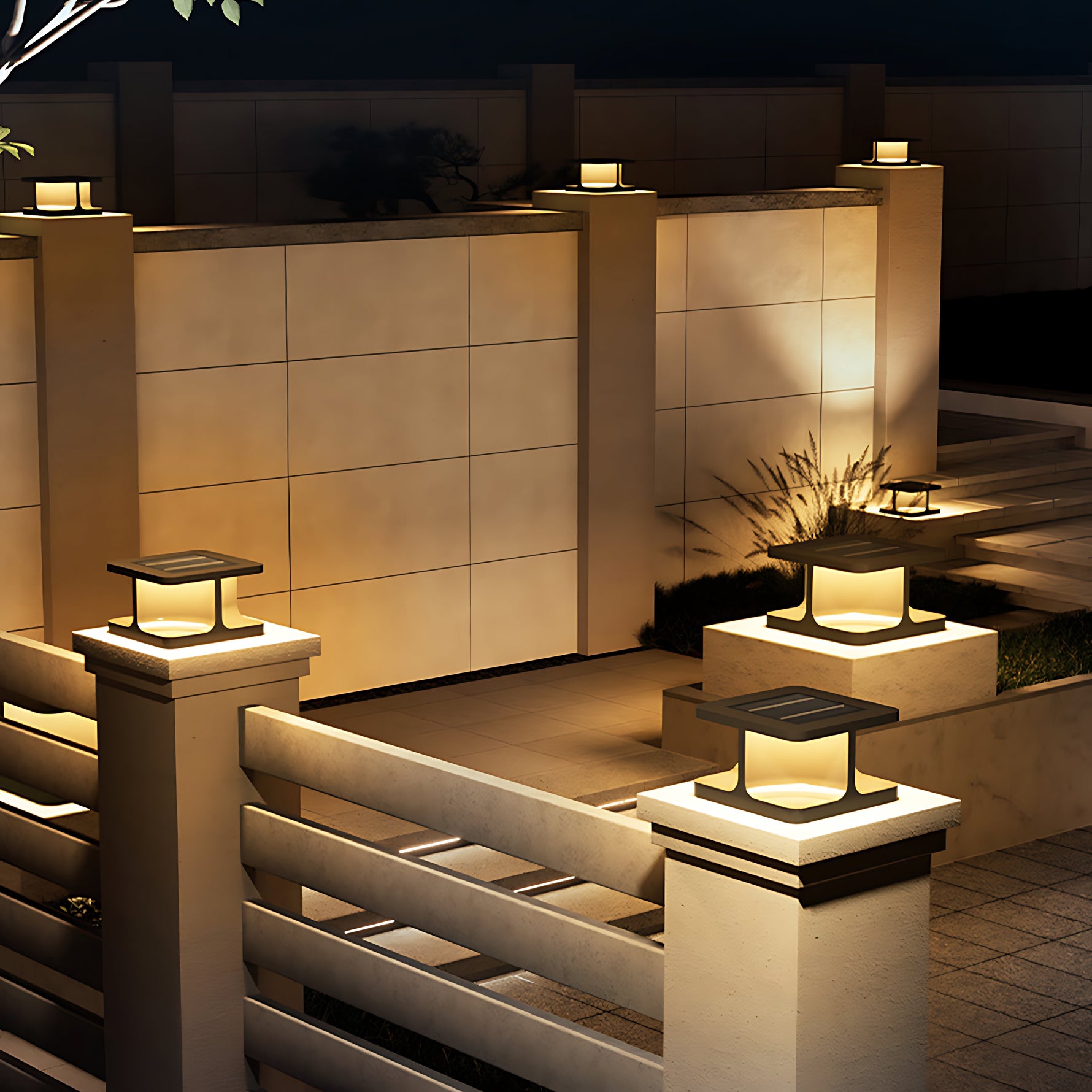 Multiple cube-shaped post lights creating sophisticated evening lighting along stone steps and pathways