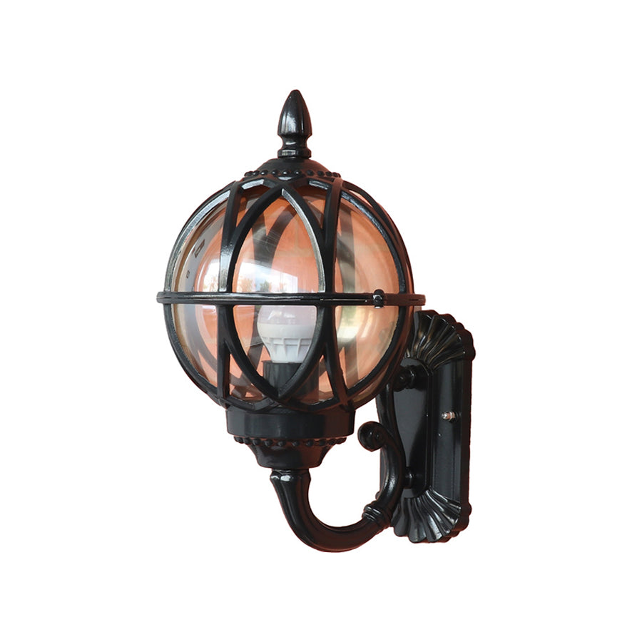 Black maritime wall light with protective cage design for coastal outdoor applications