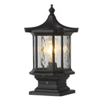 Traditional black post lantern with clear glass panels and classic pagoda-style roof design