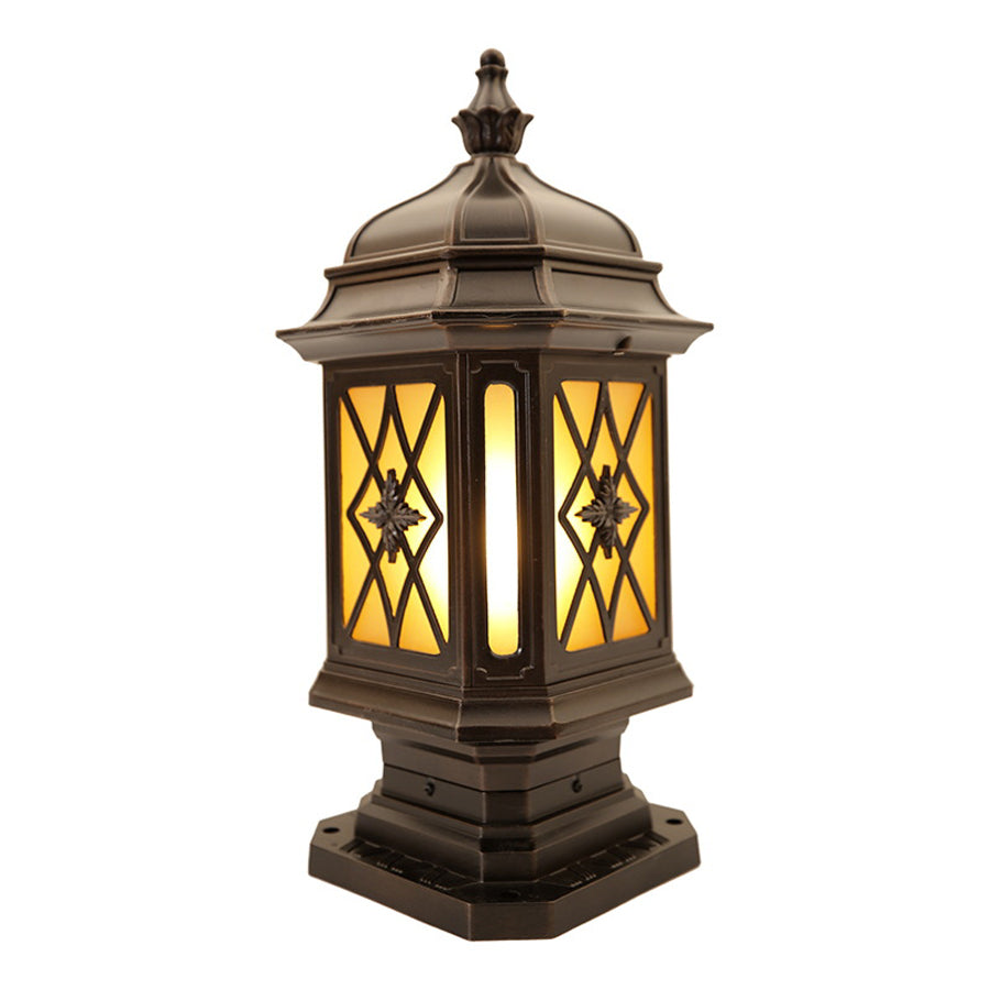 Traditional black post light with diamond-patterned glass displayed against white background