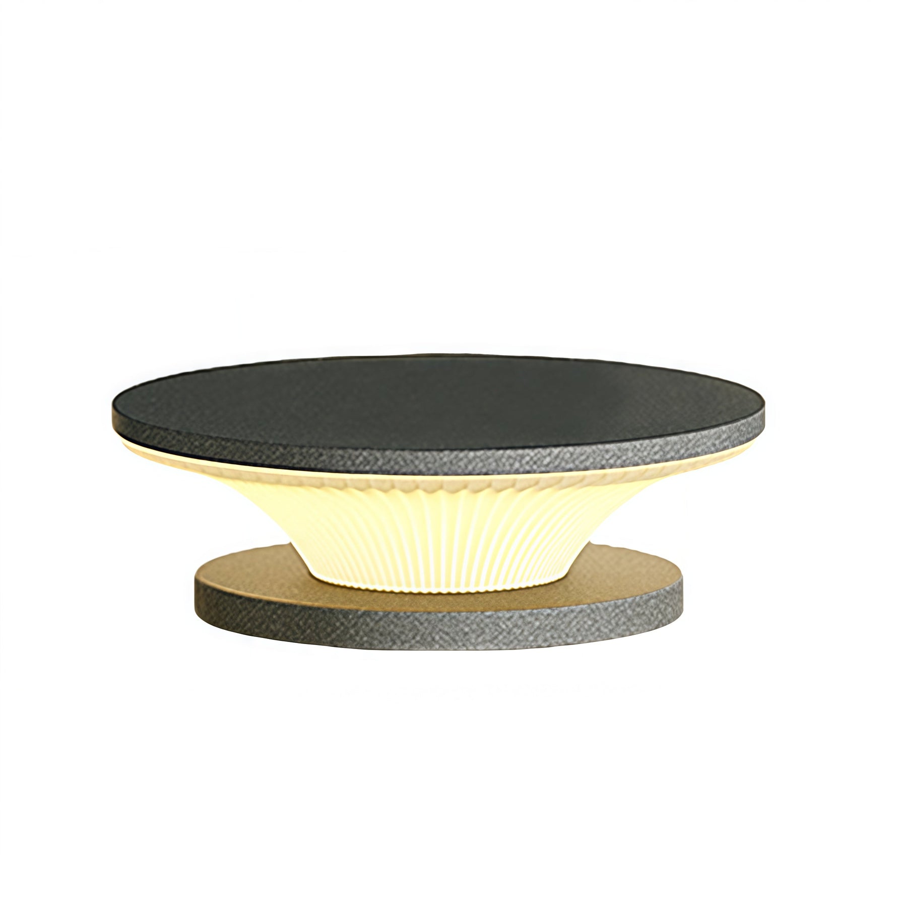 Modern circular light fixture with tiered design and warm accent lighting elements