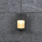 Contemporary recessed wall lighting integrated into concrete garden wall with landscape surroundings