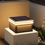 Contemporary cube post light with clean lines and warm ambient illumination for pathway and garden lighting