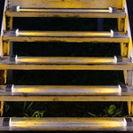 Contemporary step lighting installation on modern staircase with clean linear LED strips