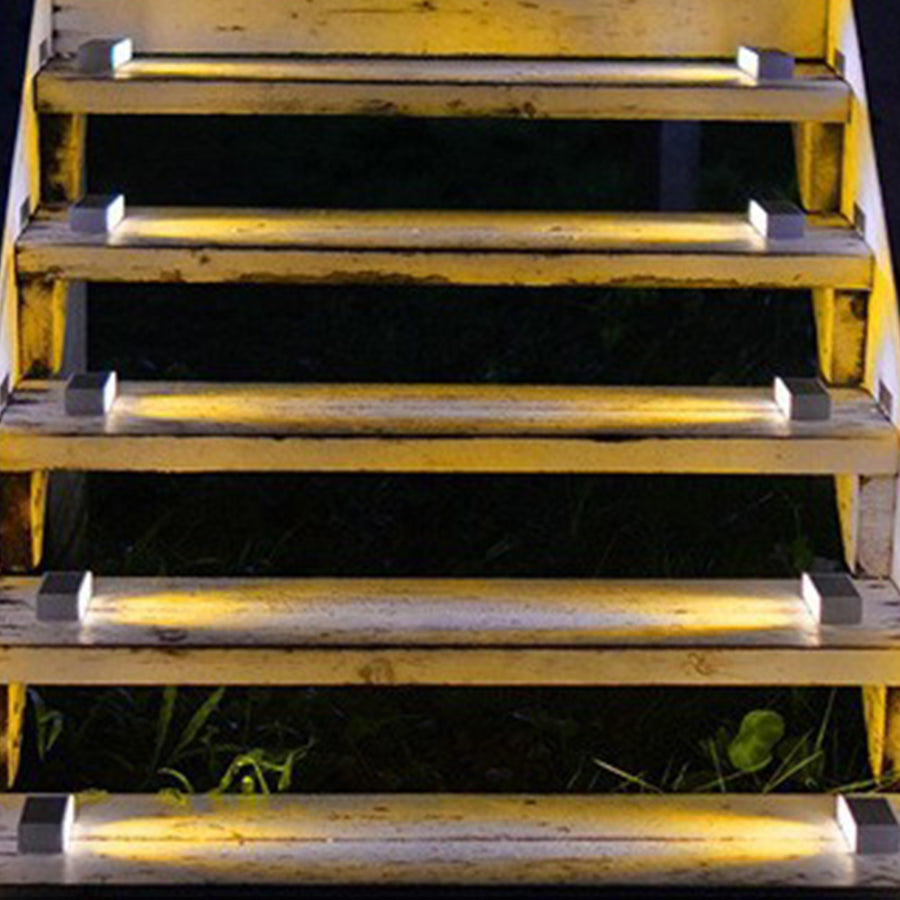 Contemporary step lighting installation on modern staircase with clean linear LED strips