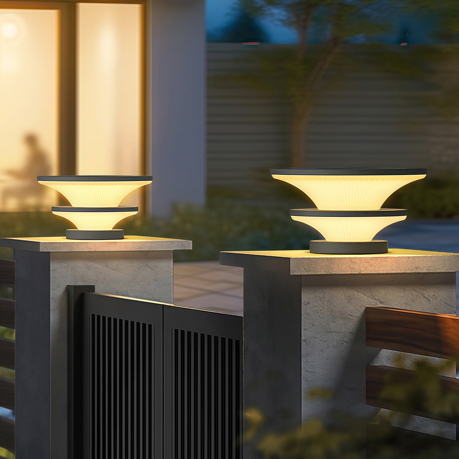 Contemporary stacked pillar lights providing architectural accent lighting for modern outdoor space