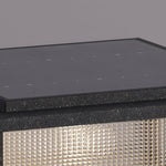 Corner view showing construction details of black frame and mesh panel assembly on LED fixture
