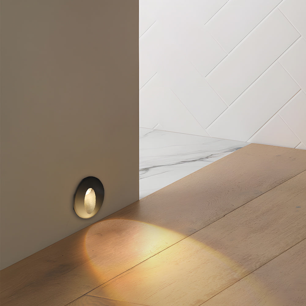 Minimalist recessed wall light installed in contemporary interior corner setting