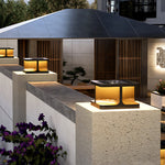 Multiple cube-shaped post lights creating sophisticated evening lighting along stone steps and pathways
