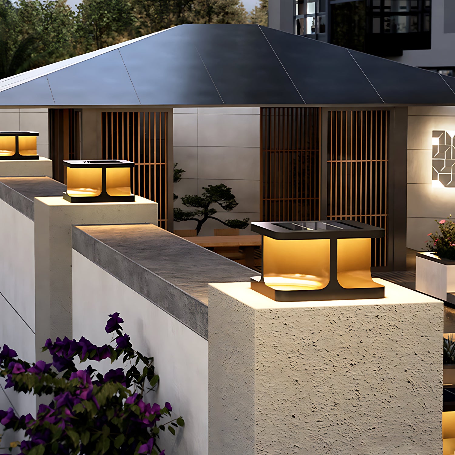 Multiple cube-shaped post lights creating sophisticated evening lighting along stone steps and pathways