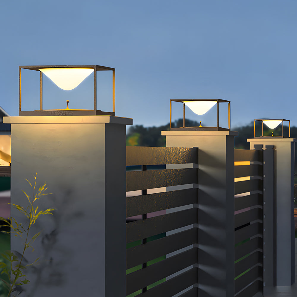 Multiple cubic LED lights arranged on stepped concrete elements creating sophisticated outdoor ambiance