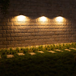 Rustic stone wall featuring warm LED accent lighting creating cozy atmospheric ambiance