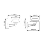 Contemporary outdoor wall sconce with conical shade casting warm light on white siding