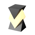 Modern angular post light with geometric V-shaped design creating dramatic upward and downward illumination
