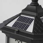 Classic outdoor lantern with swirled glass pattern and traditional black metal construction