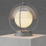 Elegant orb light creating ambient illumination on modern concrete pedestal or surface