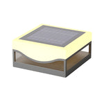 Elegant solar light installation on architectural element with warm evening glow
