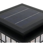Japanese-style solar lanterns placed on stone surface creating peaceful zen garden atmosphere with natural rock elements