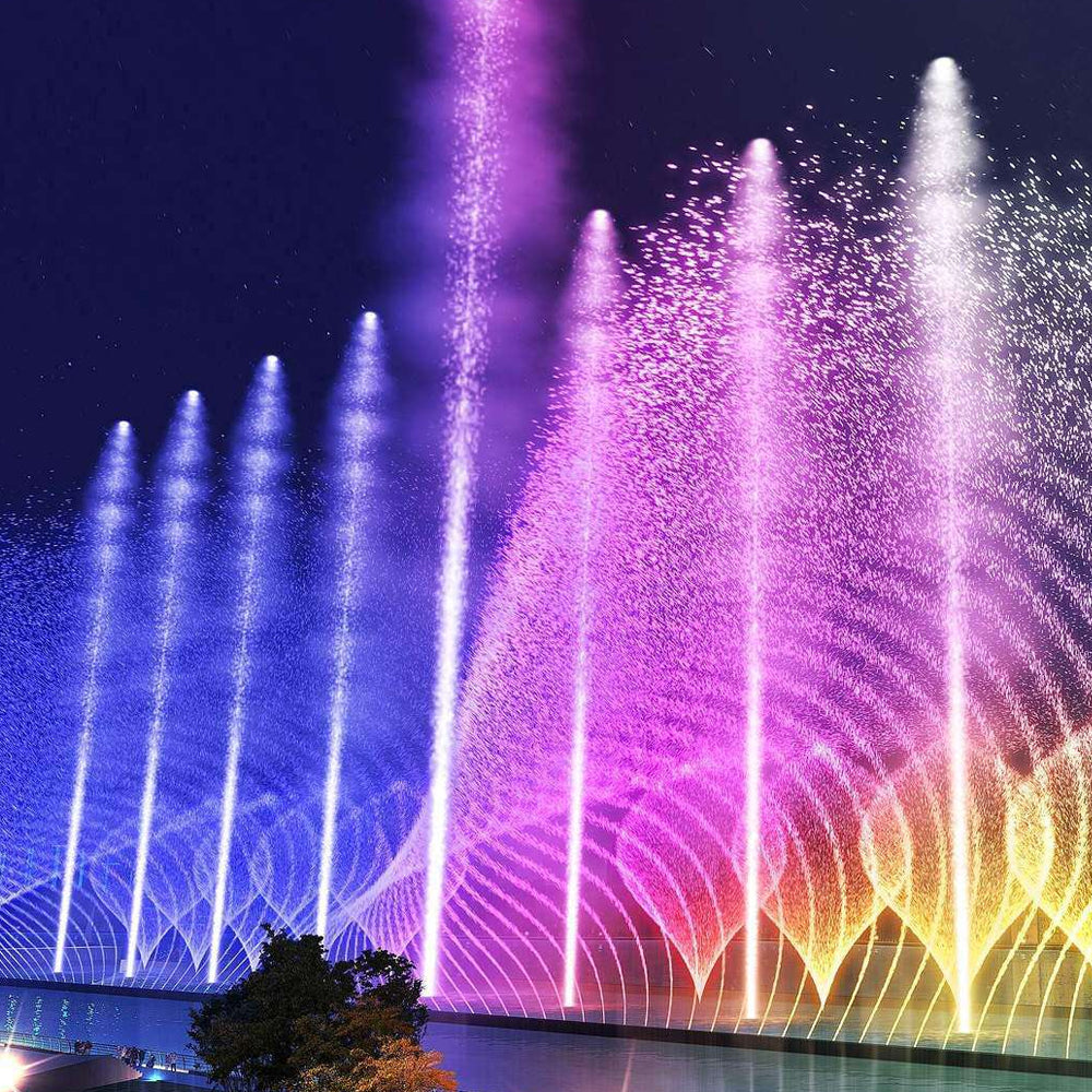 Close-up view of illuminated fountain jets with underwater LED lighting effects