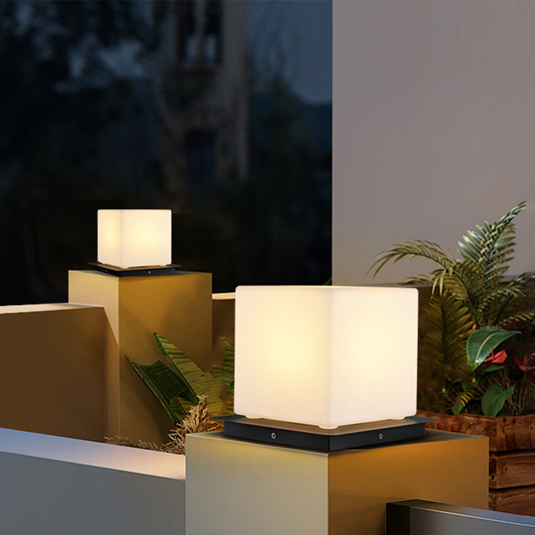 Modern geometric LED lights arranged on contemporary outdoor furniture creating sophisticated evening ambiance