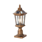 Heritage-inspired golden pillar lantern with traditional cage design and decorative metalwork elements