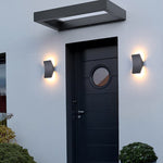 Sleek gray geometric wall light with angular design and modern architectural styling