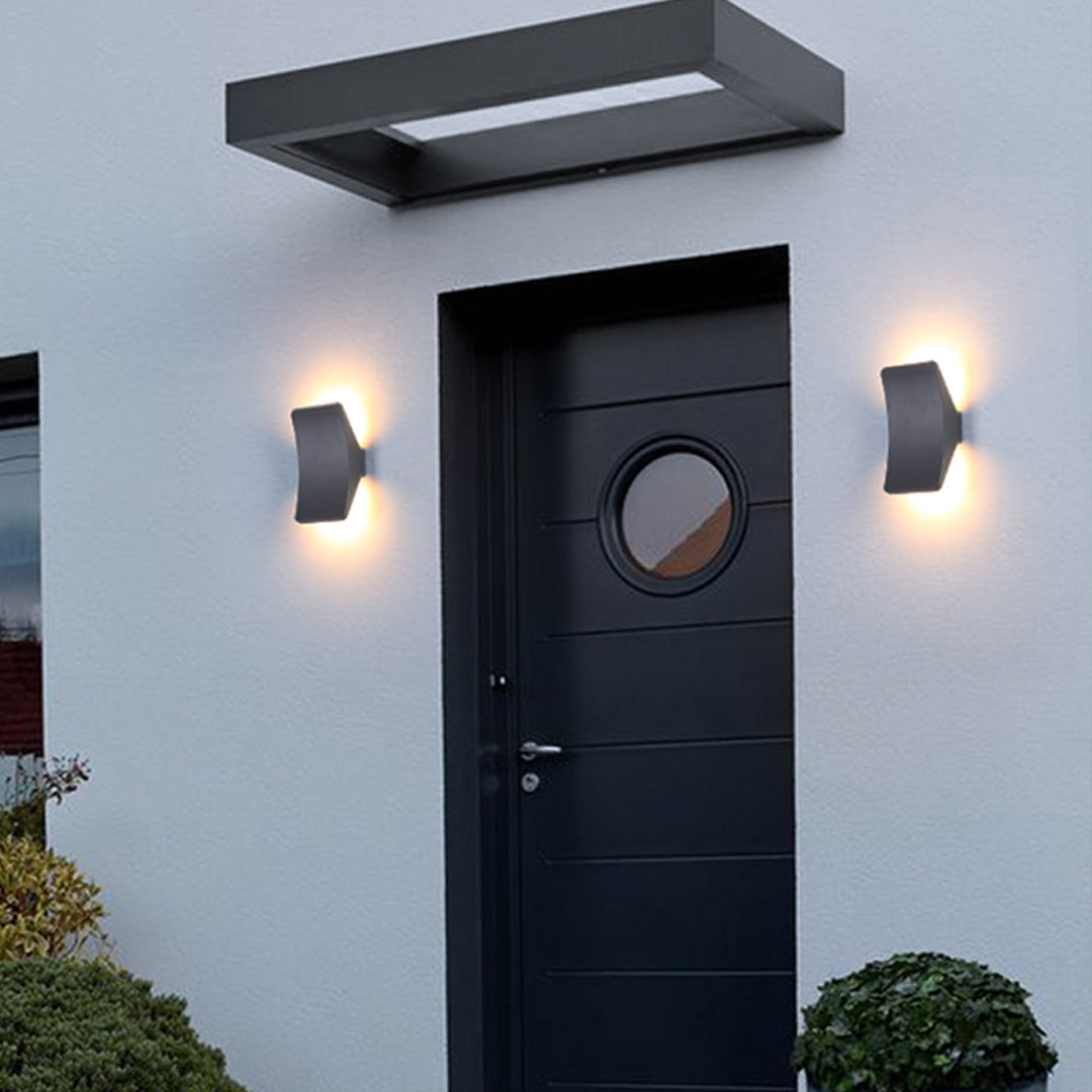 Sleek gray geometric wall light with angular design and modern architectural styling