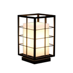 Collection of Japanese-style lantern lights with black frames and warm white panels displayed in various outdoor settings