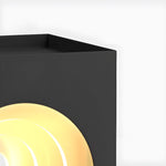 Detailed view of warm light emanating from arch opening