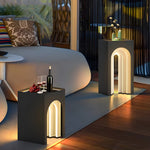Arch lamps providing ambient light in spa bathroom