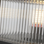 Close-up view of metal fence pickets showing detailed construction and spacing patterns